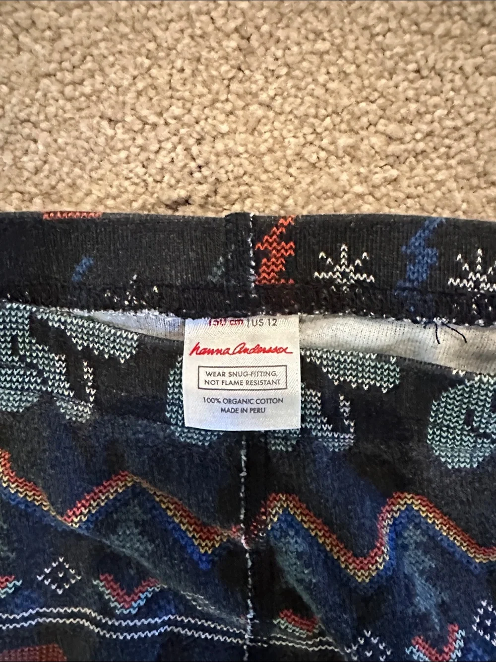 Hanna Andersson Navy Pajama Set with Green & Red Pattern